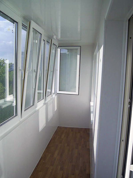 Тёплое и холодное распашное остекление балконов алюминиевым профилем Руза